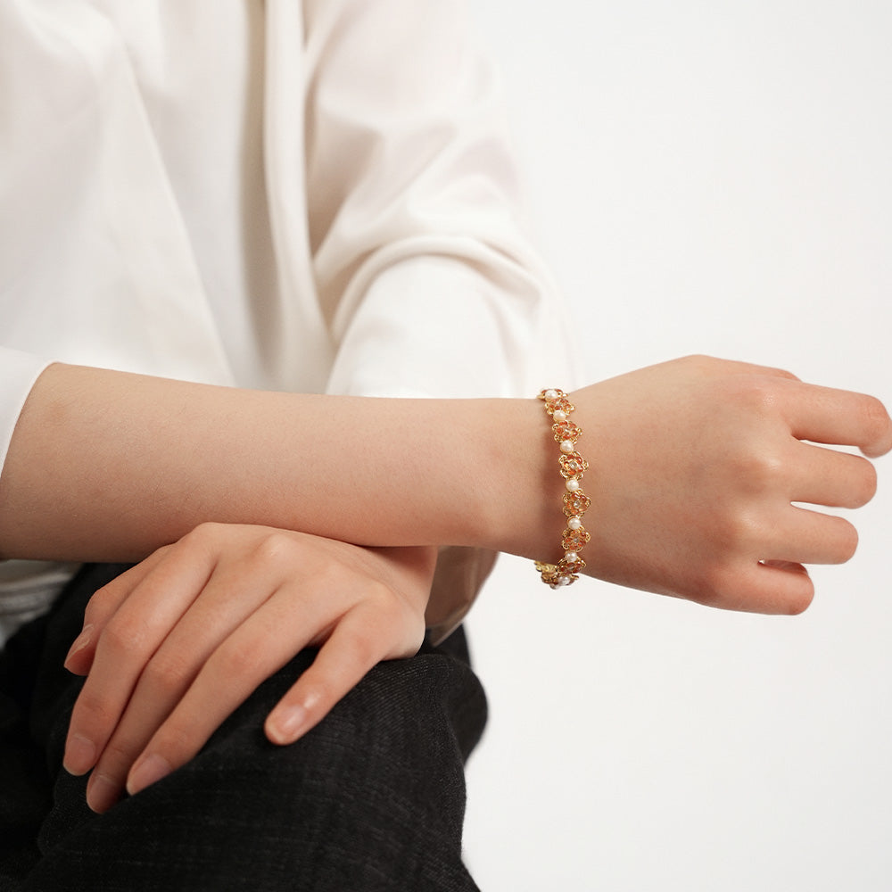 Pearl Bracelet with Stone Inlay and Peach Blossom Design