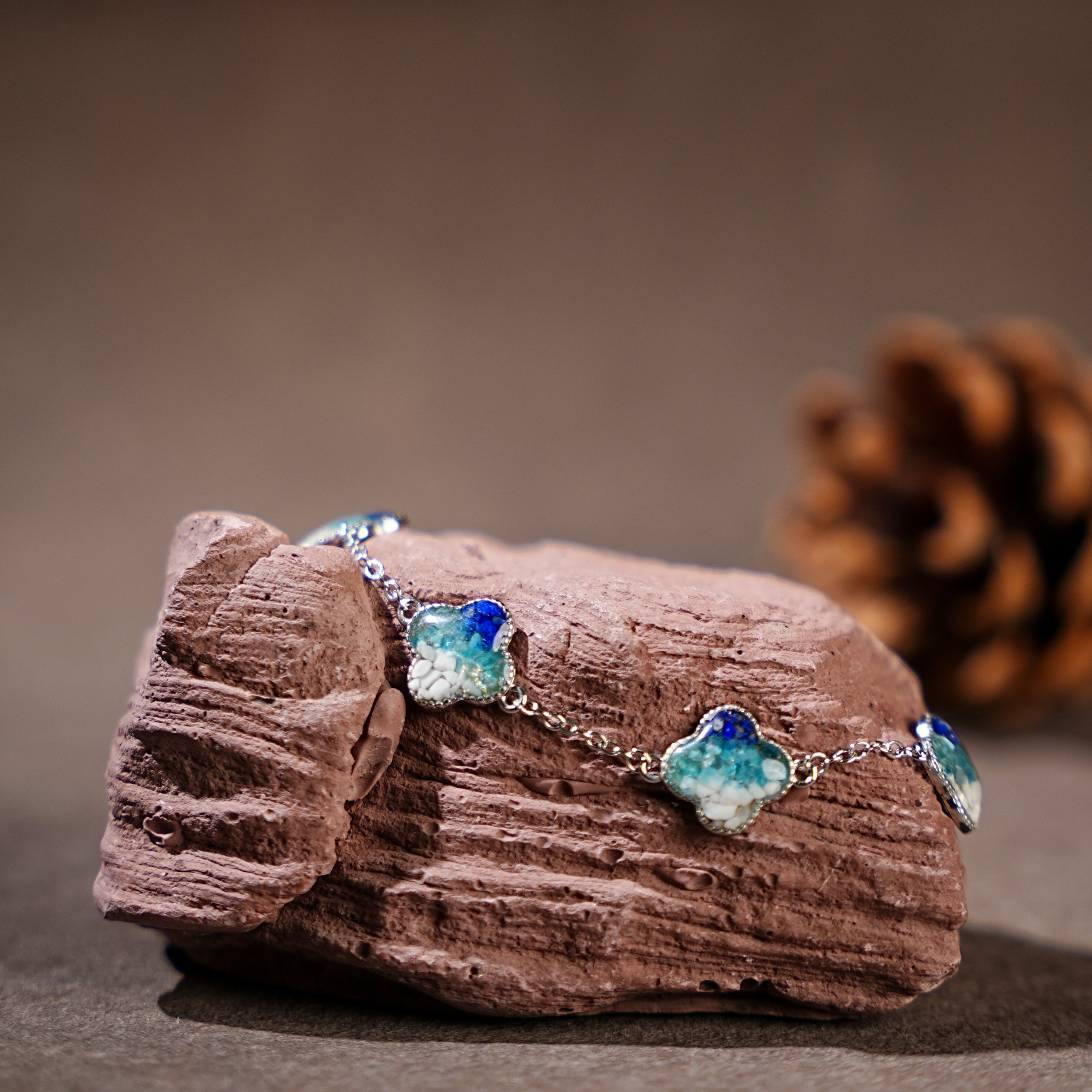 Silver Four-Leaf Clover Bracelet – Blue & White