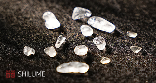 Material Properties, Origin, and Use of White Turquoise-Type Stone in Colored-Stone Inlay