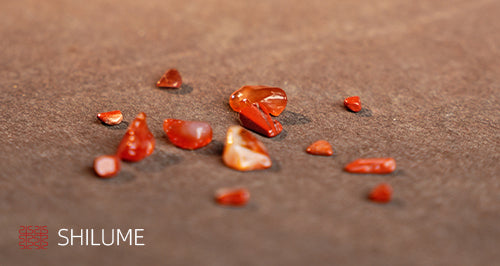 Material Properties, Origin, and Use of Nanhong Agate in Colored-Stone Inlay