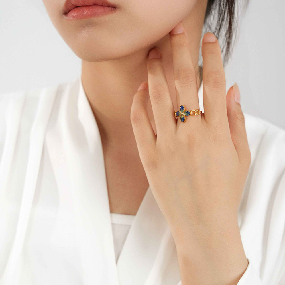 Rainbow Stone Inlaid Four-Leaf Clover B-Shaped Ring in Sapphire Blue Gradient