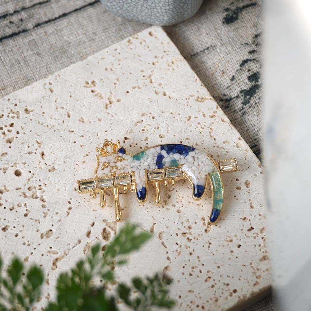 Enameled Blue-and-White Cat Brooch with Colorful Stone Inlay
