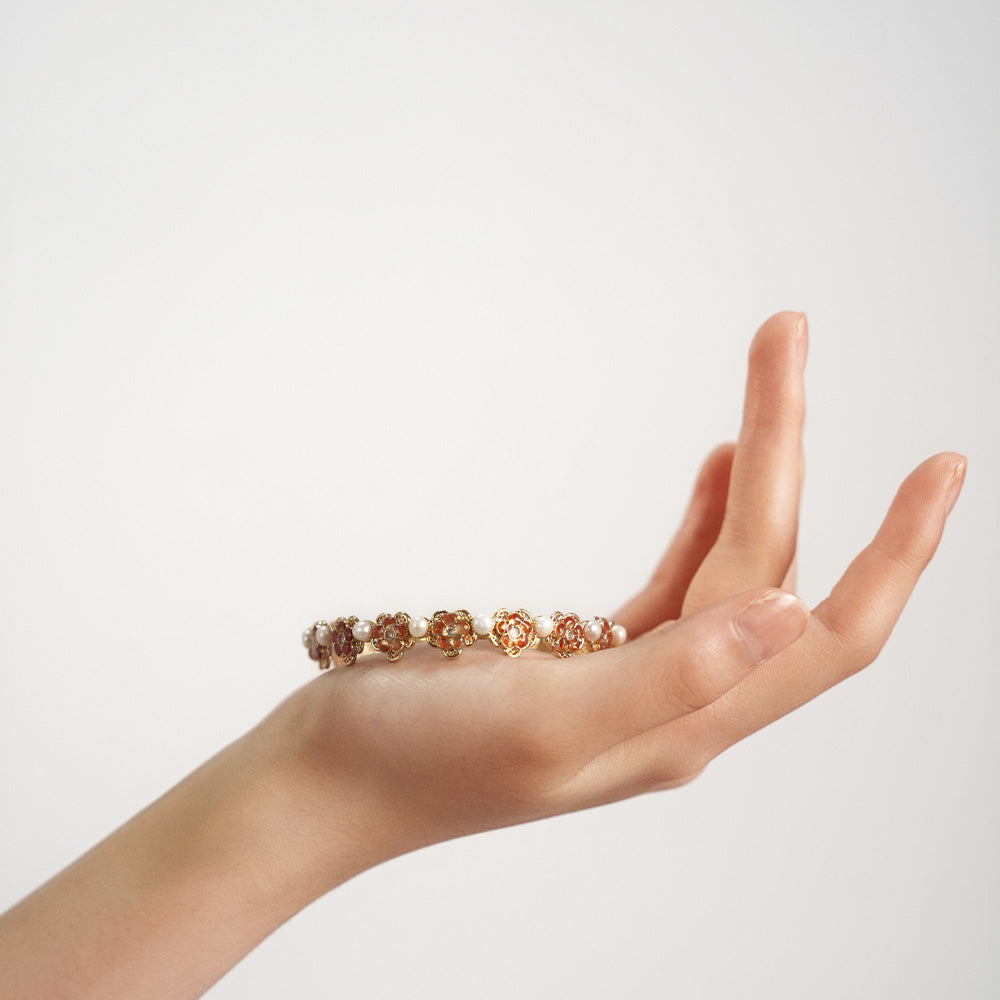 Pearl Bracelet with Stone Inlay and Peach Blossom Design