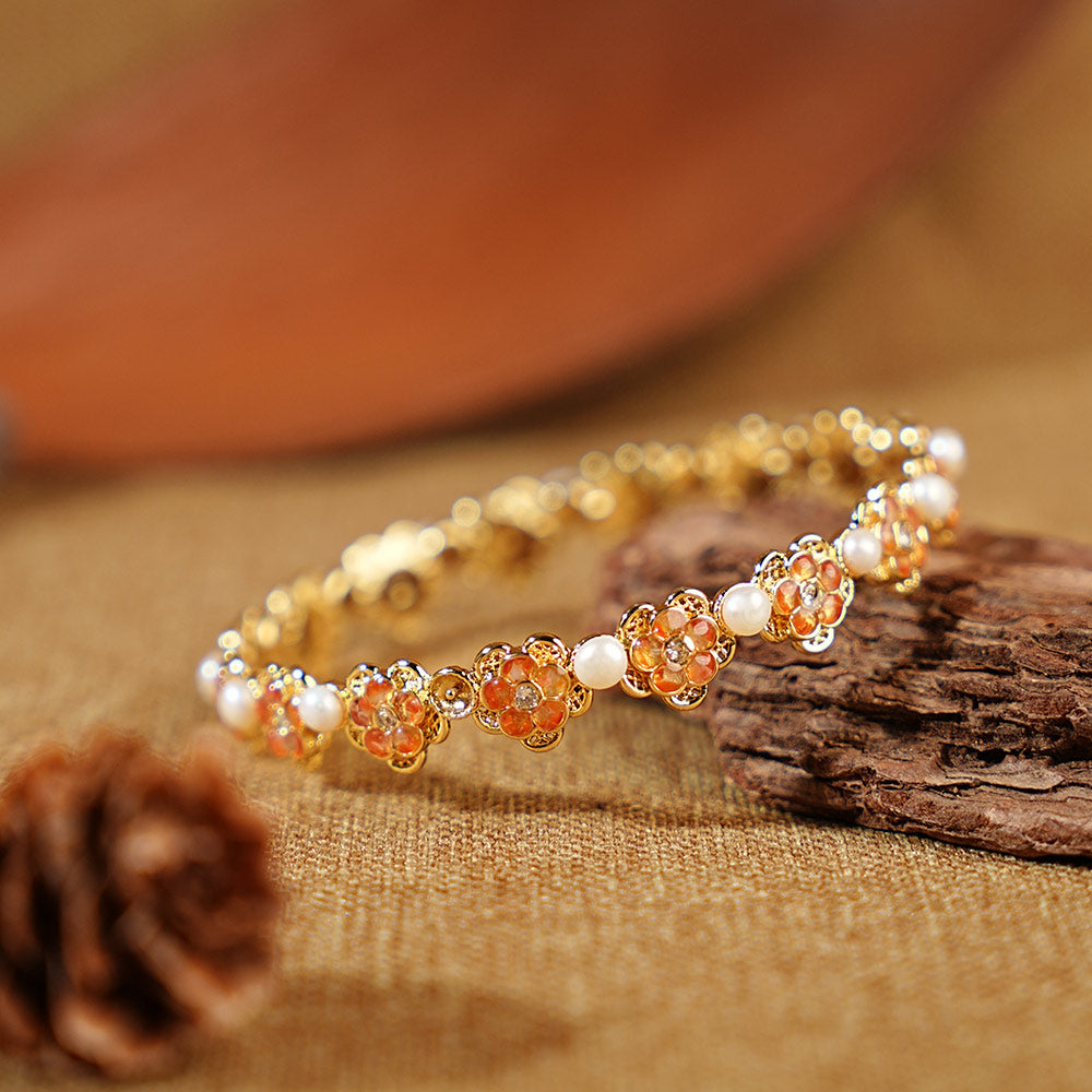 Pearl Bracelet with Peach Blossom Design