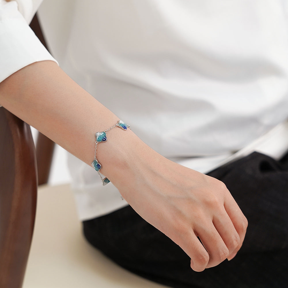 Color Stone Inlay Silver Four-Leaf Clover Bracelet – Blue & White
